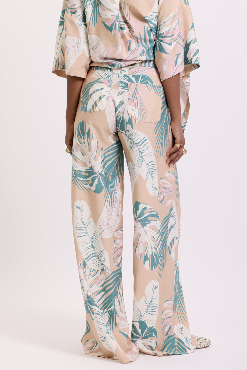 Blush Tropical Leaves Flared Pants