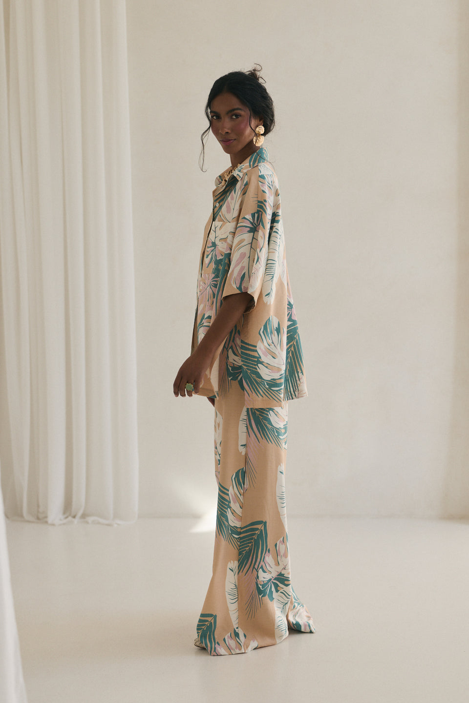 Blush Tropical Leaves Flared Pants